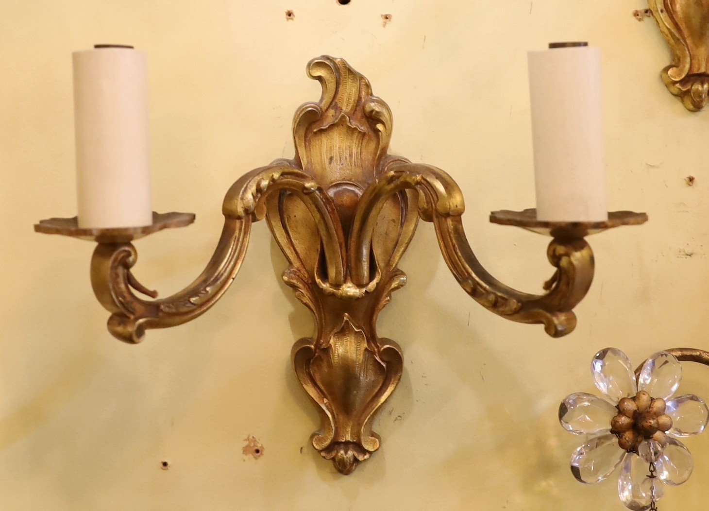 A pair of late 19th century French ormolu twin branch wall lights, height 21cm